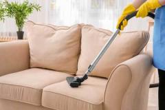 Cleaners Use Latest Equipments To Clean Sofa And